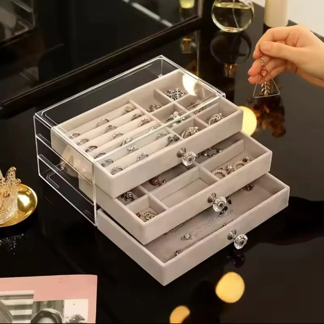 Top drawer view showing ring and earring compartments