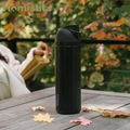 Owala FreeSip 32oz black water bottle top view showing lid and drinking spout
